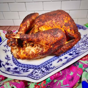 Whole Roasted Turkey on a blue and white serving platter